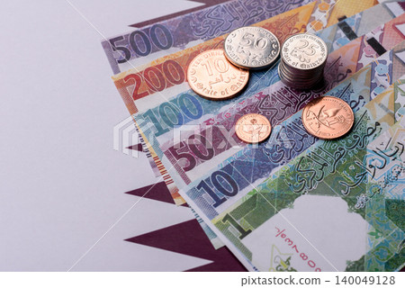 Qatar paper money, the Qatari riyal as a tool for financial transactions and trade. Qatari money Qatar paper money, the Qatari riyal as a tool for financial transactions and trade. Qatari money 140049128
