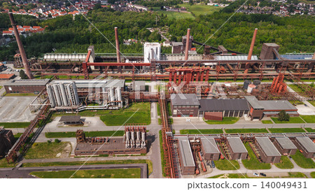 Aerial view of Zollverein Coal Mine Industrial Complex in Essen with historic factory buildings and industrial infrastructure in Germany 140049431
