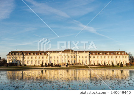 Stuttgart, Germany, December 27, 2025: New Palace Stuttgart baroque palace on Schlossplatz reflected in water at sunset in Stuttgart Germany Stuttgart, Germany, December 27, 2025: New Palace Stuttgart baroque palace on Schlossplatz reflected in water at sunset in Stuttgart Germany 140049440