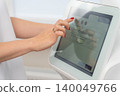 using a touchscreen on modern cosmetic equipment 140049766
