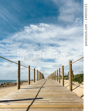 Wooden Walkway Leading to Praia Mar e Sol Beach 140050315