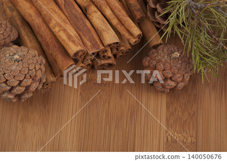 Cinnamon on a wooden floor. Cinnamon on a wooden floor. 140050676