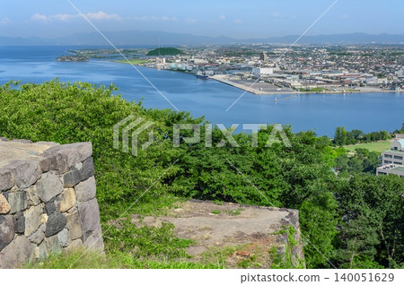 A beautiful coastal panorama overlooking Lake Nakaumi, Yonago Port, and the Shimane Peninsula from the castle tower base of Yonago Castle (Yonago City, Tottori Prefecture) A beautiful coastal panorama overlooking Lake Nakaumi, Yonago Port, and the Shimane Peninsula from the castle tower base of Yonago Castle (Yonago City, Tottori Prefecture) 140051629