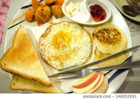 A Nepalese breakfast featuring fruit and egg dishes. A Nepalese breakfast featuring fruit and egg dishes. 140052091
