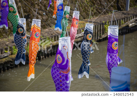 A carp streamer with a spiral pattern sways in the wind. A carp streamer with a spiral pattern sways in the wind. 140052543