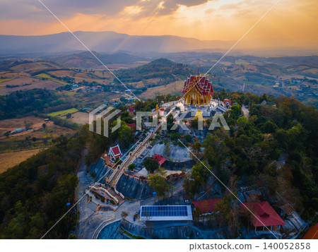 Landscape of Wat Pa Phu Hai Long on the mountain at sunset and twilight at Pak Chong, Nakhon Ratchasima, Thailand. Landscape of Wat Pa Phu Hai Long on the mountain at sunset and twilight at Pak Chong, Nakhon Ratchasima, Thailand. 140052858