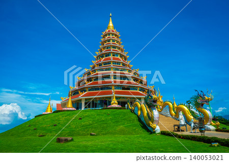 Landscape of Wat Huay Pla Kung temple with dragon symbol travel destination the famous place religious attractions of Chiang Rai province, Northern of Thailand. Landscape of Wat Huay Pla Kung temple with dragon symbol travel destination the famous place religious attractions of Chiang Rai province, Northern of Thailand. 140053021