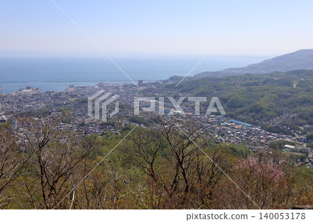 Springtime in Hokkaido, springtime in Otaru, the fragrant breezes of May in Hokkaido, the port town of Otaru viewed from Tenguyama Observatory, one of Hokkaido's three great night views. Springtime in Hokkaido, springtime in Otaru, the fragrant breezes of May in Hokkaido, the port town of Otaru viewed from Tenguyama Observatory, one of Hokkaido's three great night views. 140053178