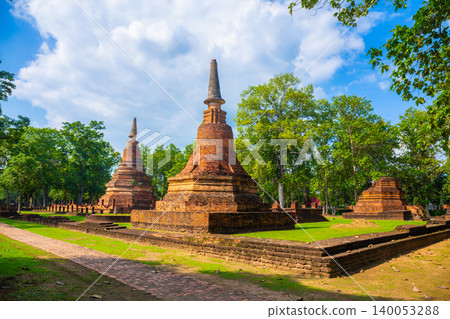 Landmark of old chedi made of ancient bricks in the Kamphaeng Phet Historical Park, Thailand. Landmark of old chedi made of ancient bricks in the Kamphaeng Phet Historical Park, Thailand. 140053288