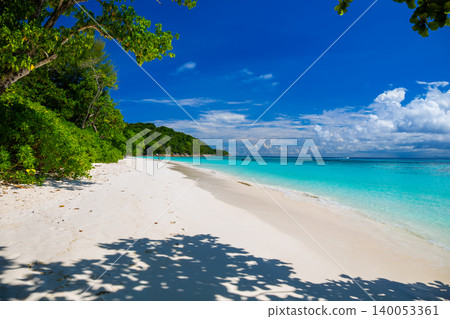 Beautiful crystal clear sea and white sand beach with boat at Tachai island, Andaman, Thailand 140053361