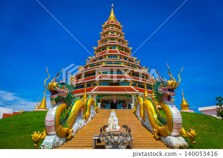 Landscape of Wat Huay Pla Kung temple with dragon symbol travel destination the famous place religious attractions of Chiang Rai province, Northern of Thailand. Landscape of Wat Huay Pla Kung temple with dragon symbol travel destination the famous place religious attractions of Chiang Rai province, Northern of Thailand. 140053416