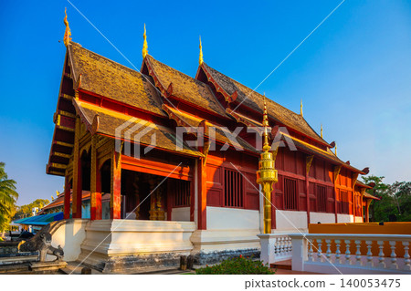 Wat Phra Singh, a wooden temple built in the ancient Lanna style, is an old temple and a popular destination for tourists and pilgrims, located in Chiang Mai, Thailand. Wat Phra Singh, a wooden temple built in the ancient Lanna style, is an old temple and a popular destination for tourists and pilgrims, located in Chiang Mai, Thailand. 140053475