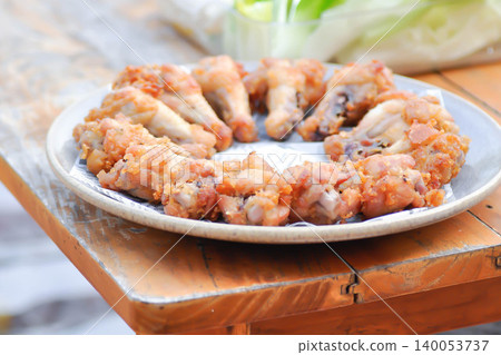 fried chick with fried garlic or chicken wings or deep fried chicken , fried chicken fried chick with fried garlic or chicken wings or deep fried chicken , fried chicken 140053737