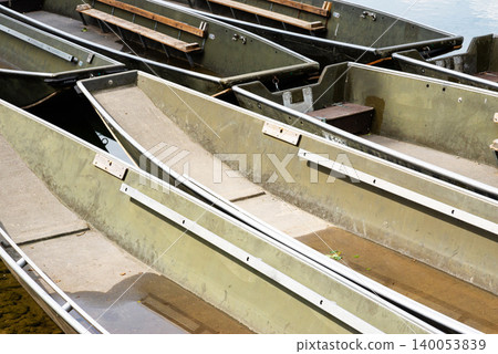 Row of Old Wooden Boats Row of Old Wooden Boats 140053839