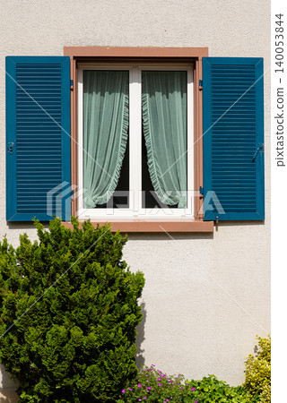 Window with Blue Wooden Shutters Window with Blue Wooden Shutters 140053844