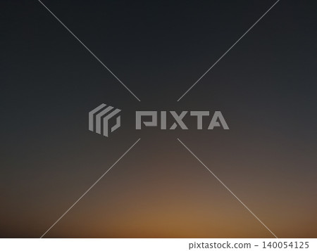 Minimalist dark sky template background. Soft golden sunrise glow shifts smoothly into deep evening gray tones, creating a clean abstract copy space layout. Minimalist dark sky template background. Soft golden sunrise glow shifts smoothly into deep evening gray tones, creating a clean abstract copy space layout. 140054125