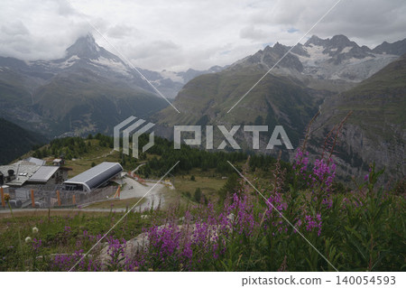 The Alps and hiking trails around Zermatt, Switzerland, a panoramic view of Switzerland in the height of summer in August. The Alps and hiking trails around Zermatt, Switzerland, a panoramic view of Switzerland in the height of summer in August. 140054593