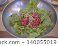 The vibrant red and green colors are sure to whet your appetite. Authentic Korean fresh yukhoe (Korean beef tartare). 140055019
