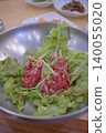 Authentic Seoul-style yukhoe (Korean beef tartare) with vibrant, fresh colors. 140055020