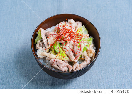 Green onion and salt pork bowl: A photo of a Japanese-style rice bowl with pork and mushrooms topped with shredded chili peppers. Green onion and salt pork bowl: A photo of a Japanese-style rice bowl with pork and mushrooms topped with shredded chili peppers. 140055478