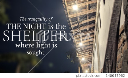 The tranquility of night is the shelter where light is sought beneath a rustic wooden eave lit by string lights creating a peaceful, introspective mood. The tranquility of night is the shelter where light is sought beneath a rustic wooden eave lit by string lights creating a peaceful, introspective mood. 140055962