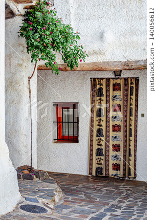 Typical street of an Andalusian village Bubion. Typical street of an Andalusian village Bubion. 140056612