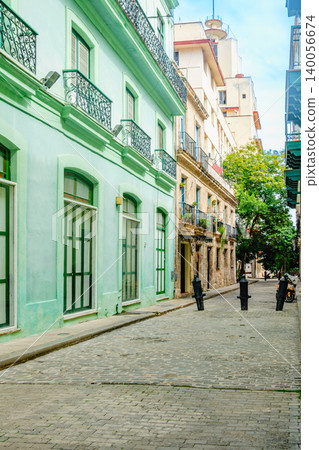 Colorful street scene in a historic neighborhood Havana, showcasing vibrant architecture 140056674