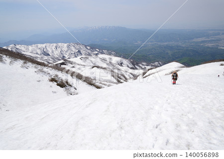 Snow-capped mountains of Echigo as seen from Mount Nioji in May. Snow-capped mountains of Echigo as seen from Mount Nioji in May. 140056898
