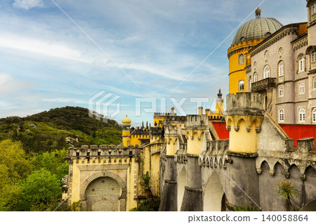 Historic architectural facade and stone walls of Pena Palace with dome tower in Sintra, Portugal Historic architectural facade and stone walls of Pena Palace with dome tower in Sintra, Portugal 140058864