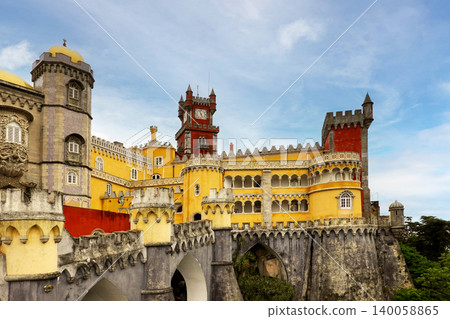 Striking facade of Pena Palace with its iconic yellow and red towers in Sintra, Portugal 140058865