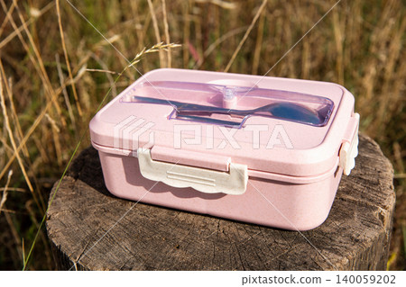 A pink lunch box 140059202