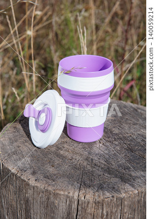 Violet-white foldable silicone cup for drinks Violet-white foldable silicone cup for drinks 140059214