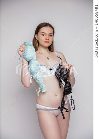 Portrait of a charming brunette Portrait of a charming brunette 140059491