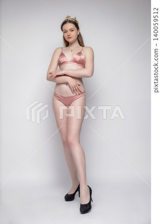 Charming woman dressed in lingerie Charming woman dressed in lingerie 140059512