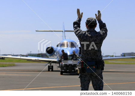 Japan Air Self-Defense Force officer and U-125A Japan Air Self-Defense Force officer and U-125A 140060150