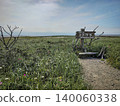 A tourist photo taken in early summer, capturing the entrance to Todowara in Betsukai Town, Hokkaido, a place known as the ends of the world. 140060338