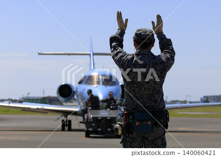 Japan Air Self-Defense Force officer and U-125A Japan Air Self-Defense Force officer and U-125A 140060421