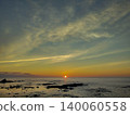 Sunset in Shiretoko Utoro: A view of the sunset sinking into the Sea of Okhotsk and the surrounding rocky shoreline from National Route 334. 140060558