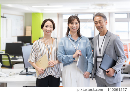 Male and female engineers working in the office Male and female engineers working in the office 140061257