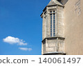 Gothic bay window with blue sky in the background. 140061497