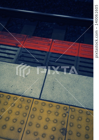 Station platform floor with tactile paving Station platform floor with tactile paving 140061605