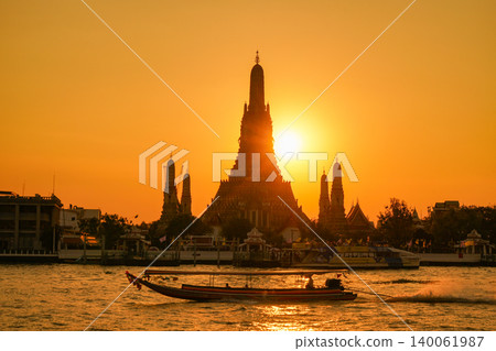 Evening view of the temple "Wat Arun" along the Chao Phraya River in Bangkok, Thailand Evening view of the temple "Wat Arun" along the Chao Phraya River in Bangkok, Thailand 140061987
