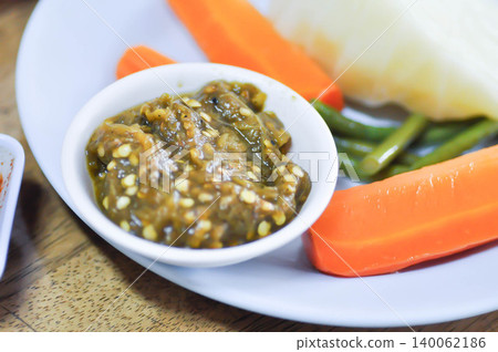 chili dip or chili paste or Thai chili paste and vegetable or boiled vegetable chili dip or chili paste or Thai chili paste and vegetable or boiled vegetable 140062186