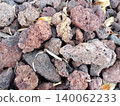 Red volcanic rock texture. 140062233