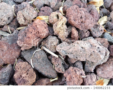 Red volcanic rock texture. Red volcanic rock texture. 140062233