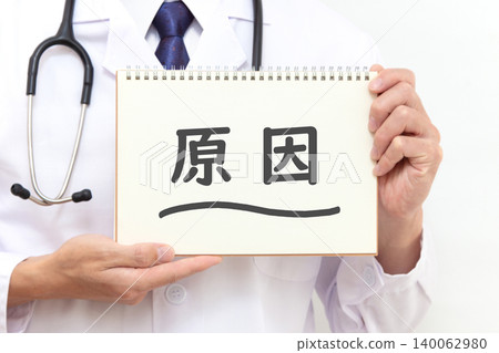A Japanese male doctor holds a notebook in his hands that lists the causes. A Japanese male doctor holds a notebook in his hands that lists the causes. 140062980