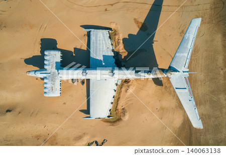 Abandoned Lun-class ekranoplan on a deserted beach near the Caspian Sea under a clear blue sky Abandoned Lun-class ekranoplan on a deserted beach near the Caspian Sea under a clear blue sky 140063138