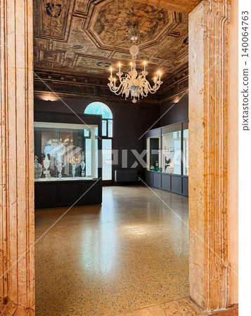 Historic interior hall of Murano Glass Museum with artistic exhibits Historic interior hall of Murano Glass Museum with artistic exhibits 140064763