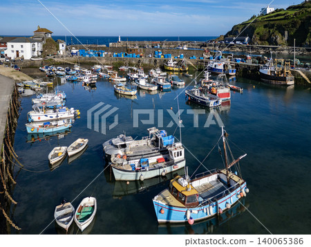 Aerial view of the harbor at Mevagissey on the south coast of Cornwall, England. Aerial view of the harbor at Mevagissey on the south coast of Cornwall, England. 140065386