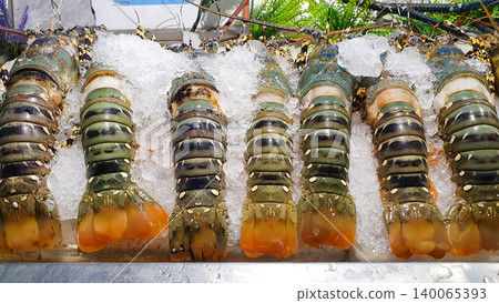 Fresh Asian Lobsters On Ice For Sale In Market. Fresh Asian Lobsters On Ice For Sale In Market. 140065393